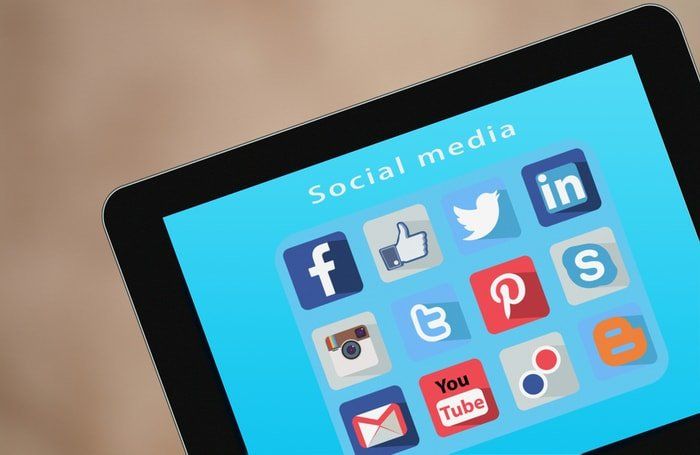 Different social media platforms shown on a tablet