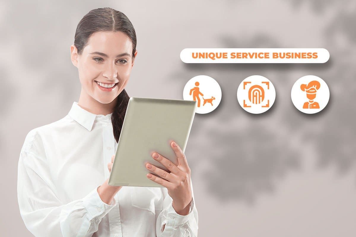 Smartly dressed young woman using a tablet to search for unique service business ideas